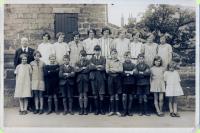 Head teacher Mr Hough and his class of summer 1930 - click for full size image