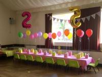 Use of modular stage units to create a low table for children's parties - click for full size image