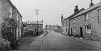 View further up the High Street circa 1960 - click for full size image View further up the High Street circa 1960 - click for full size image