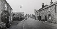 View further up the High Street circa 1960 - click for full size image